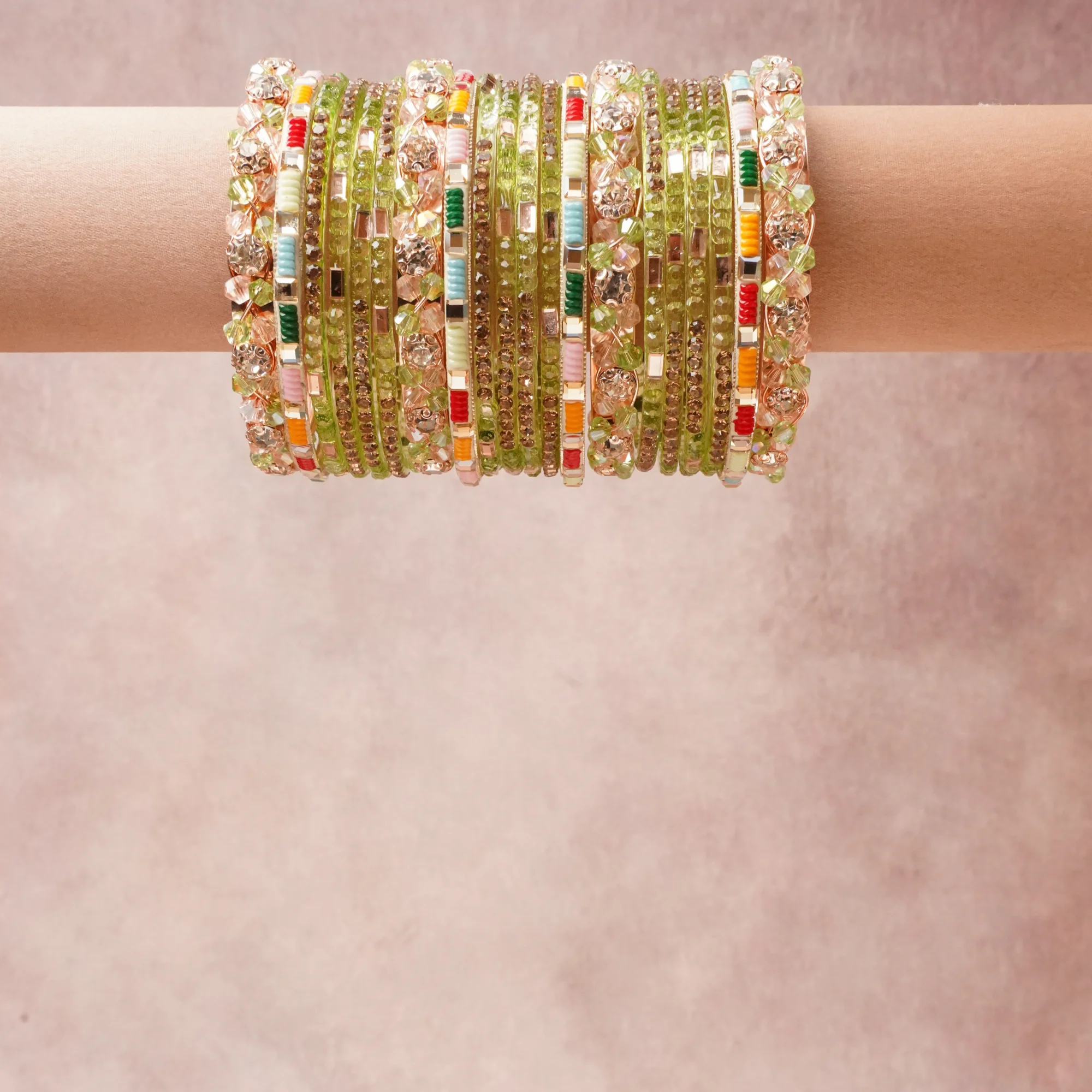 A commanding Lime Green anchors this beautiful set, enriched with accents of Clear/Transparent, Gold, Coral Red, Marigold Orange, Sky Blue, Rose Pink, Emerald Green that add depth and dimension.

Featuring a striking composition of Glass, Crystal, Gold-toned Metal, this set carries intricate craftsmanship and strong presence. Grand in form, it is created for moments that deserve to be marked.